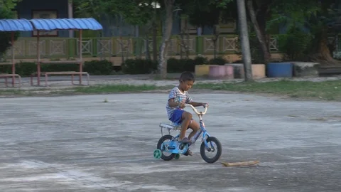 Slow motion boy drive bicycle Stock-Footage 91303374