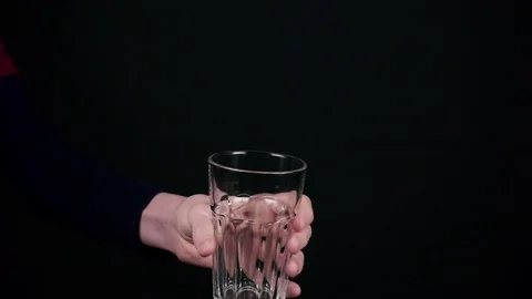 Slow motion the boy holds out a glass and the woman pours a cola Stock-Footage 88143668