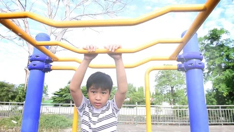 Slow motion boy play bar Stock Footage 80555496