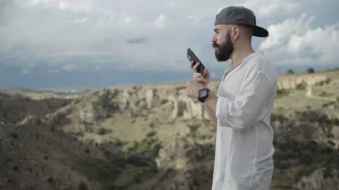 Slow Motion of Boy Talking On His Smartphone in Matera. Italy Stock Footage 167139984