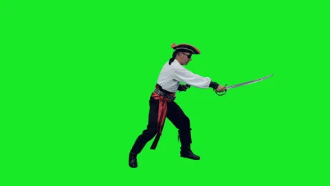 Slow motion of brave pirate attacking with sword and pistol on green background Stock-Footage 304294482