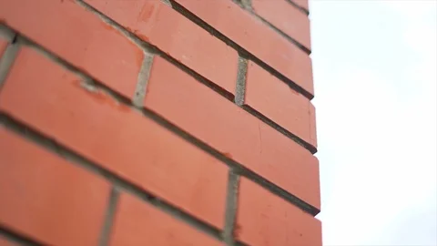 Slow motion of a brick house wall Stock Footage 91514288