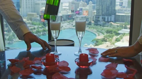 Slow motion of bride and groom hands as they toast with champagne Stock Footage 115925267