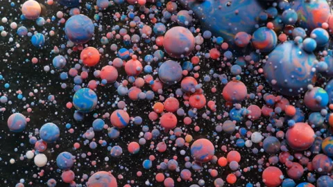 Slow Motion Bright Colors Bubbles Oil Beautiful Paint Surface Universe Color  Video stock 115180811