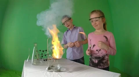 Slow motion. A bright flash of the reagent. Stock Footage 60606201