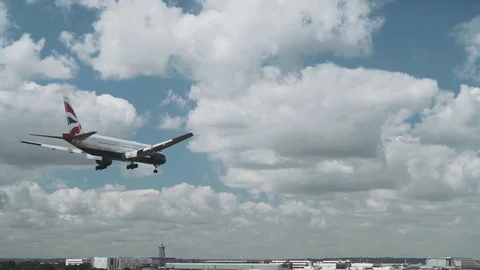 Slow motion British Airways plane extreme close-up landing 3 Stock Footage 111913394