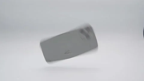 Slow motion of broken smartphone falling. Isolated on white background Stock Footage 199000047