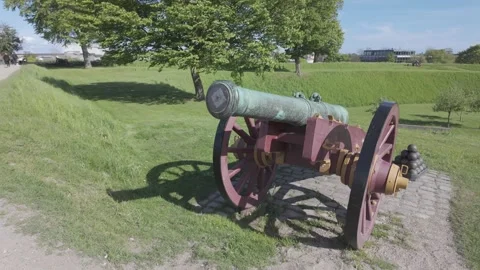 Slow motion bronze cannon on a red gun carriage, Kastellet Stock Footage 341288803