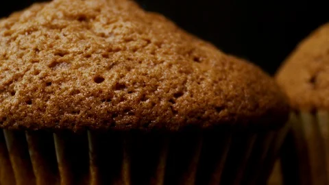 Slow motion brown muffins sprinkle with sugar close up Stock Footage 112632118