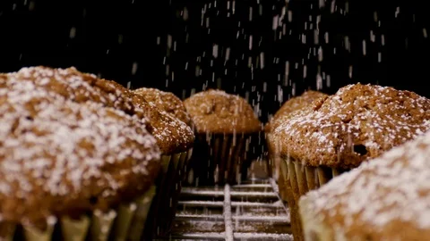 Slow motion brown muffins sprinkle with sugar close up Stock Footage 112633146