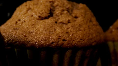 Slow motion brown muffins sprinkle with sugar close up Stock Footage 112633805