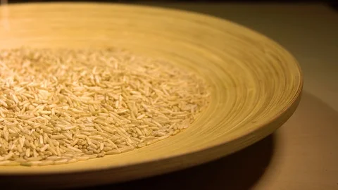 Slow motion Brown rice pouring with slider Video stock 101743566