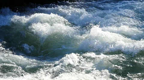 Slow motion Bubbling water in a mountain river Stock Footage 63451631