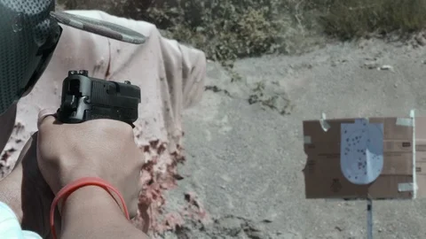 Slow Motion Bullet Casing and Pistol Shooting, Gun Range, Handgun Man Target Aim Stock Footage 107502517