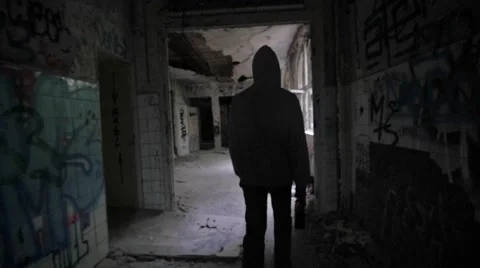 Slow motion of a bum walking in an abandoned house Video stock 58612963