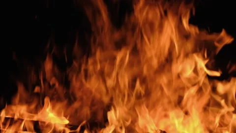 Slow motion burning bonfire. Close-up shot of warm cozy burning fire. Slow Stock Footage 157894153