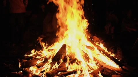 Slow motion burning bonfire. Close-up shot of warm cozy burning fire. Slow Stock Footage 158068417