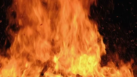 Slow motion burning bonfire. Close-up shot of warm cozy burning fire. Slow Stock Footage 158071698