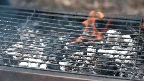 Slow motion burning coals fire and smoke Stock Footage 109561678