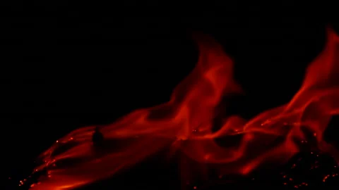 Slow motion of burning fire and flame on ground isolated on black background Stock Footage 306276731