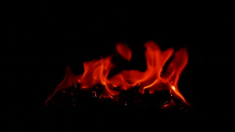 Slow motion of burning fire and flame on ground isolated on black background Vídeo Stock 307627659
