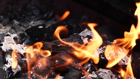 Slow motion burning fire flame, closeup night bonfire, fireplace, campfire, bbq Video stock 242975723
