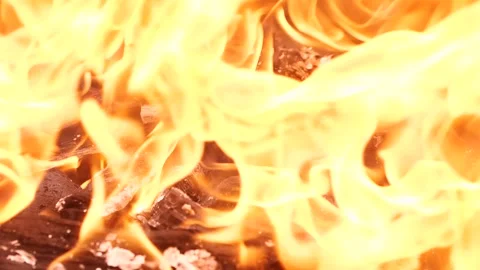 Slow motion burning fire flame, closeup night bonfire, fireplace, campfire, bbq Video stock 245134215