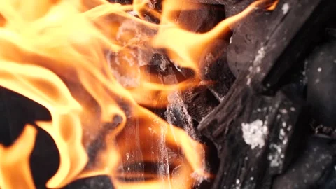 Slow motion burning fire flame, closeup night bonfire, fireplace, campfire, bbq Video stock 258636768