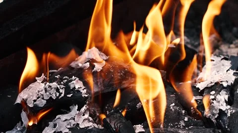 Slow motion burning fire flame, closeup night bonfire, fireplace, campfire, bbq Video stock 262828963