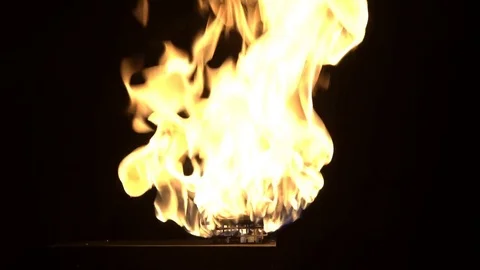 Slow motion burning gas flame blast isolated on black background. Stock Footage 75147881