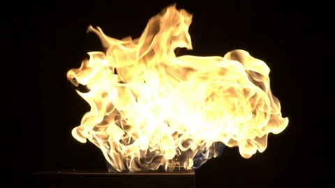 Slow motion burning gas flame blast isolated on black background. Stock Footage 75148384