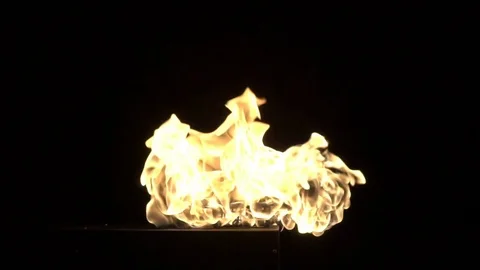 Slow motion burning gas flame blast isolated on black background. Stock Footage 75148641