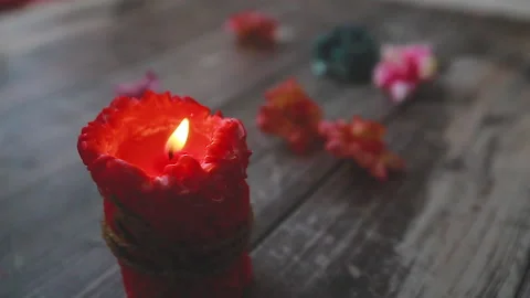 Slow-motion burning of a pink decorative candle on a darkened background. Stock Footage 147952531