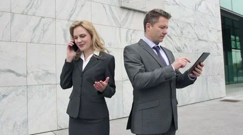 Slow Motion Of Business Executives Doing Business On Phones Stock Footage 35251797