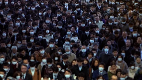Slow motion of business people inside Shinagawa Station. Japanese passengers-Dan Stock Footage 124397757