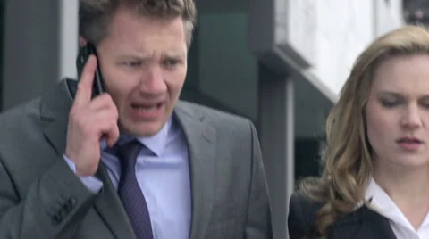 Slow Motion Of Business Team Walking And Arguing On Phone. Close-Up. Stock Footage 35246009