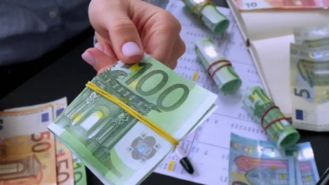 Slow motion Business Woman Displaying a Spread of Cash euros. Close-up. Income Stock Footage