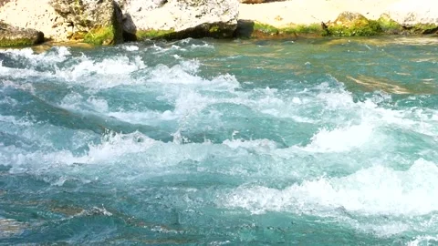 Slow motion of a bustling, mountain river. Stock Footage 138132553