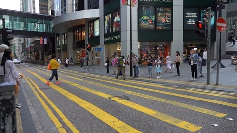 Slow Motion of Busy streets of Central District in Hong Kong and Pedestrians  Stock Footage 125649368