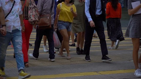 Slow Motion of Busy streets of Central District in Hong Kong and Pedestrians  Stock Footage 125649403