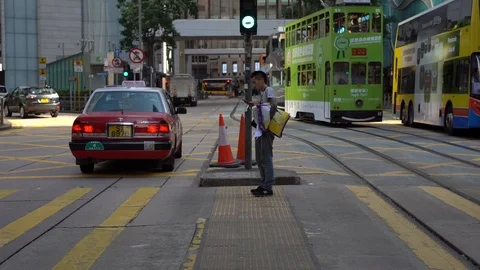 Slow Motion of Busy streets of Central District in Hong Kong and Pedestrians  Stock Footage 125649404