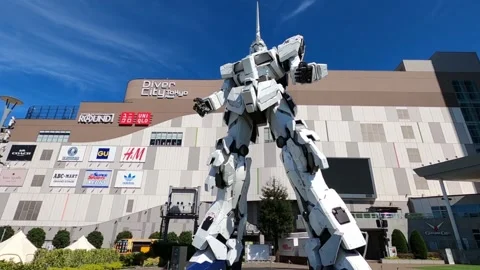 Slow motion cam move around Unicorn Gundam Odaiba Diver City Stock Footage 157137747