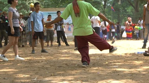 Slow motion cambodians having fun with some spectators looking how they play-Dan Stock Footage 119056931