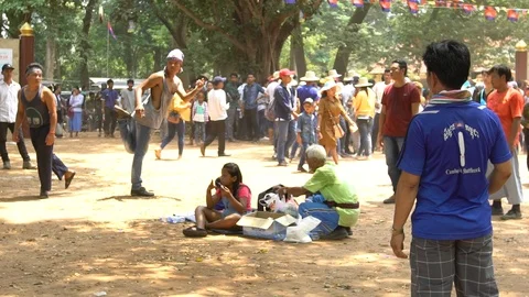 Slow motion of cambodians playing a local game named jianzi -Dan Stock Footage 119056936