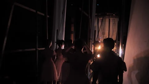 Slow motion camera of ballet dancers waiting backstage to go out to perform Vídeos de archivo 195813502