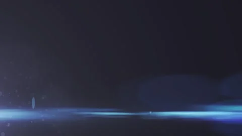 Slow motion camera lens flare moving effect on dark background overlay. 库存影片 344088100