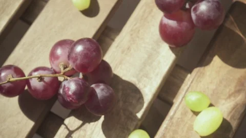 Slow motion the camera moves on the table with grapes and a drink in a glass Stock-Footage 89030652