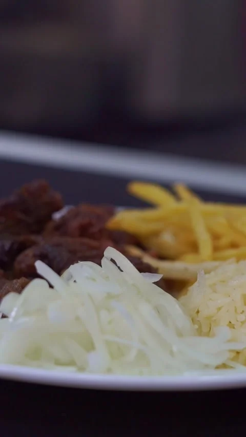 Slow motion camera panning of traditional roasted beef meat served with crispy f Stock Footage 341464852
