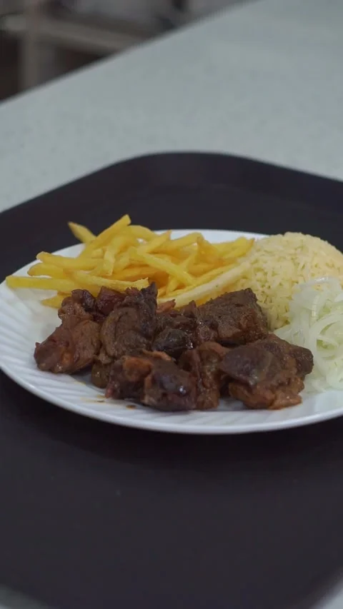 Slow motion camera panning of traditional roasted beef meat served with crispy f Stock Footage 341465626