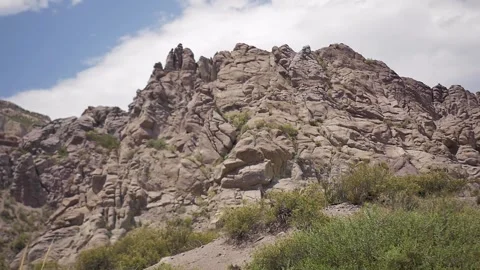 Slow motion camera passing through rock formations Stock Footage 255900322